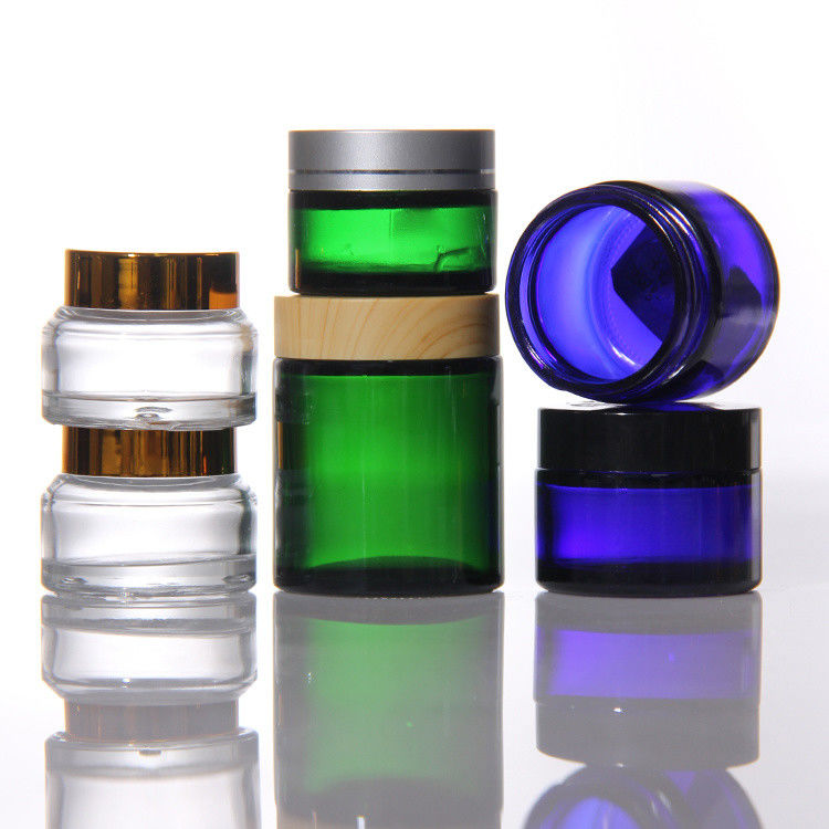 ODM gekleurde cosmetica glazen crème potten met gouden acacia deksel