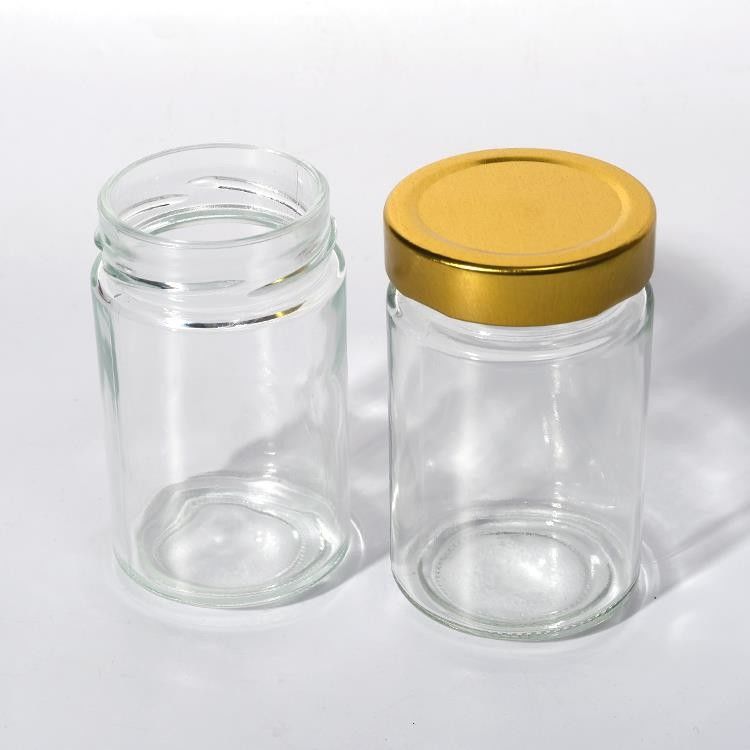 Voedselfabriek Gebruik 1 Oz 4 Oz 8 Oz Ronde vorm Helder lege opslagcontainer Glas Jelly Jam Honing Sauce Jar