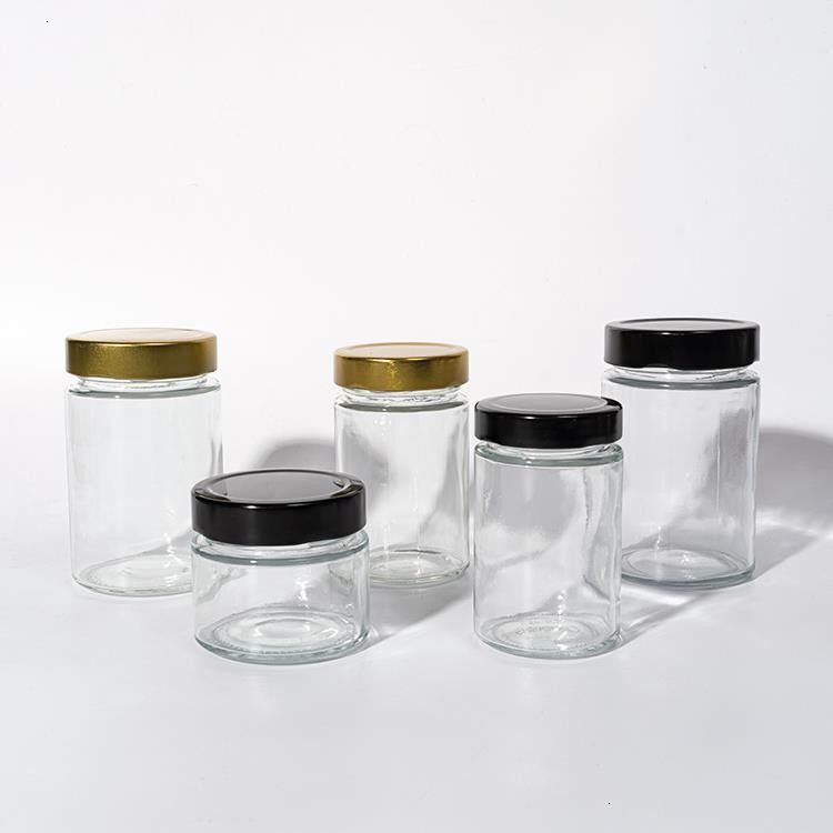 Voedselfabriek Gebruik 1 Oz 4 Oz 8 Oz Ronde vorm Helder lege opslagcontainer Glas Jelly Jam Honing Sauce Jar
