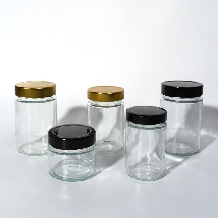 Voedselfabriek Gebruik 1 Oz 4 Oz 8 Oz Ronde vorm Helder lege opslagcontainer Glas Jelly Jam Honing Sauce Jar