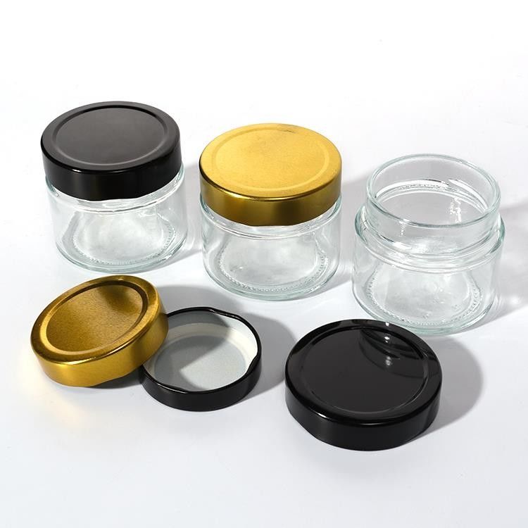 Voedselfabriek Gebruik 1 Oz 4 Oz 8 Oz Ronde vorm Helder lege opslagcontainer Glas Jelly Jam Honing Sauce Jar